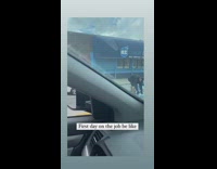 Two guys pick up dropped water bottles