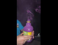 Opening bottle of motts juice purple smoke 