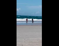 Collab IITW - Guy red swim brief bend over sand