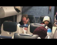 guy not using hands to eat popcorn out of bag