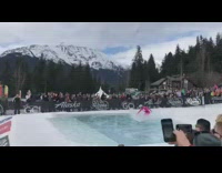Woman in pink power ranger suit skis down slope and pond skims over water, scorpions and falls into pool