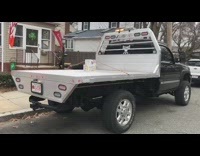 tow truck with two packs of beer