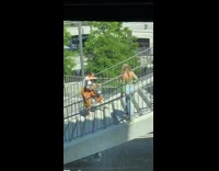 Girl poses for photos on staircase