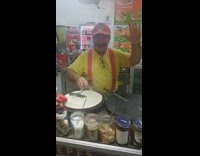 Greek mario crepe man sing at work