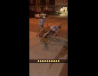 Two guys ride metal luggage cart fail 