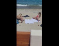 Girl bikini sit sideway beach white towel