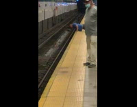 Blue shirt guy push ups subway station 