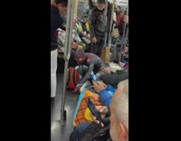 Spiderman poses for video in train 