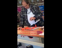 Guy deciding which product to buy with pendulum