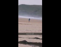 Collab Kook Of The Day - Blue shirt guy fishing rod pole sand 