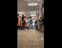 Collab VIBES - Woman skating on thrift store and falls