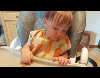 Kid falling asleep while on highchair 