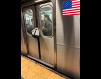 Womans bag caught on subway trains door 