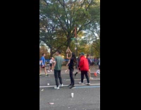 Collab WINY - Group try to give alcohol shots in NYC marathon