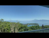 Mount Fuji seen with and without a telescope