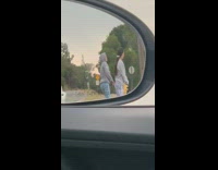 Two girls grey sweater dance side mirror
