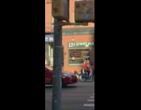 Guy wears only underwear socks shoes outside