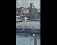 Woman roller skates on an empty parking lot