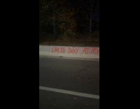 Filmer shows vandalism at concrete road barricade