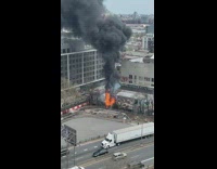 Lumberyard on fire captured from high rise apartment 