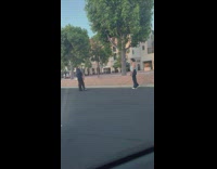 Woman blue tied top pose at parking lot