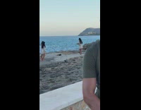 Two women white dress tiktok dance behind a man