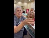 Old lady gets excited with ice cream