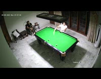 Man strike and slipped under the billiard table