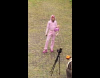 Person pink outfit and things backyard video