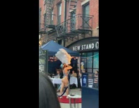 Burlesque Dancer Performs for Outdoor Diners 