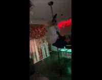 Guy swings around pole and breaks it