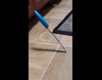 Woman drops knife stands diagonally 