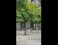 Two women puts their phone on the ground