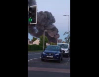 Large black smoke from fire at neighborhood