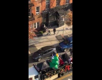 Santa Claus speak with mic on NYPD truck