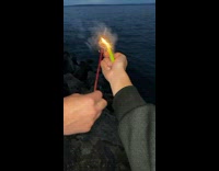 Collab BitchMP - Firework rocket pops inside of water after being lit 