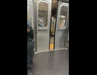 Man red pants does step workout on subway station stairs