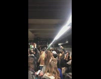 Crowd sings Jonas brothers song together inside subway station after concert