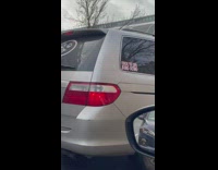 White car has bing bong sticker