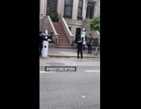 Guy walks with person in vaccine costume 
