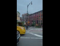 Woman black outfit balloons street stoplight countdown