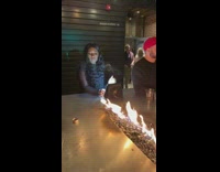 Woman bar fire pit selfie phone on bag