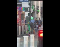 Collab winy - Person green jacket helga face on back