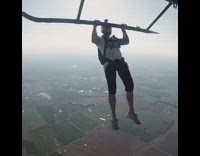 Guy jumps out of helicopter skydiving helmet