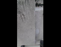 Collab WINY - Man films work on top of building