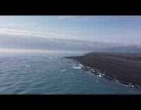 Drone shot Iceland beach lagoon ice float