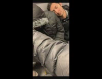 Man sleeps on stranger's shoulder on subway train