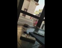 Girl takes selfies in window reflection guy inside can see