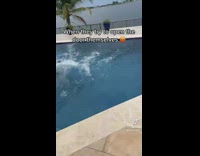 Guy throws girl into pool for opening door