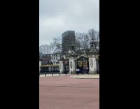 Two women sweater dance black gold gate